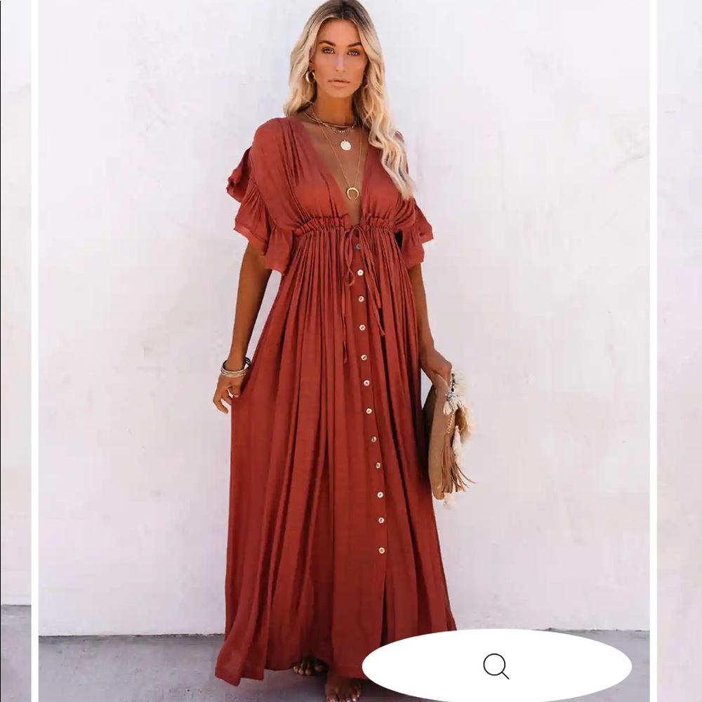 ANIKA POCKETED
BUTTON DOWN RUFFLE
MAXI DRESS -
TERRACOTTA
